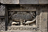 Prambanan - Candi Lara Jonggrang, kinara-kinari panels a composition of a lion with the tree of heaven and a pair of kinnara. 